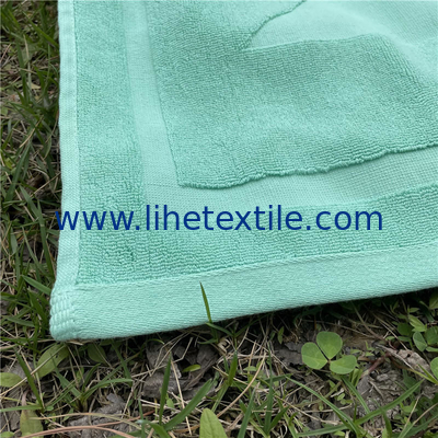 Wholesale high quality cotton embossed jacquard custom logo hotel bath beach towel