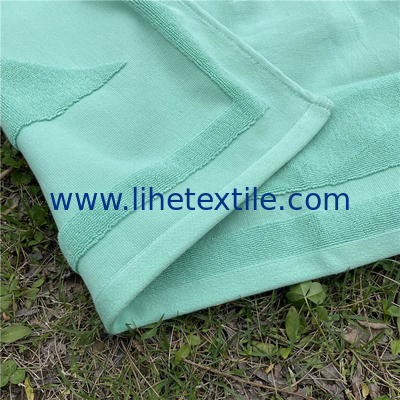 Wholesale high quality cotton embossed jacquard custom logo hotel bath beach towel