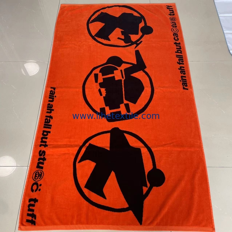 Free sample 100% cotton terry custom yarn dyed black and orange jacquard beach towel